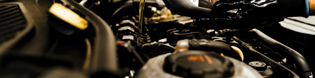 Mechanic performing major car service in Boksburg with oil change and engine inspection at ACC Automotive, an OEM-approved repair workshop.